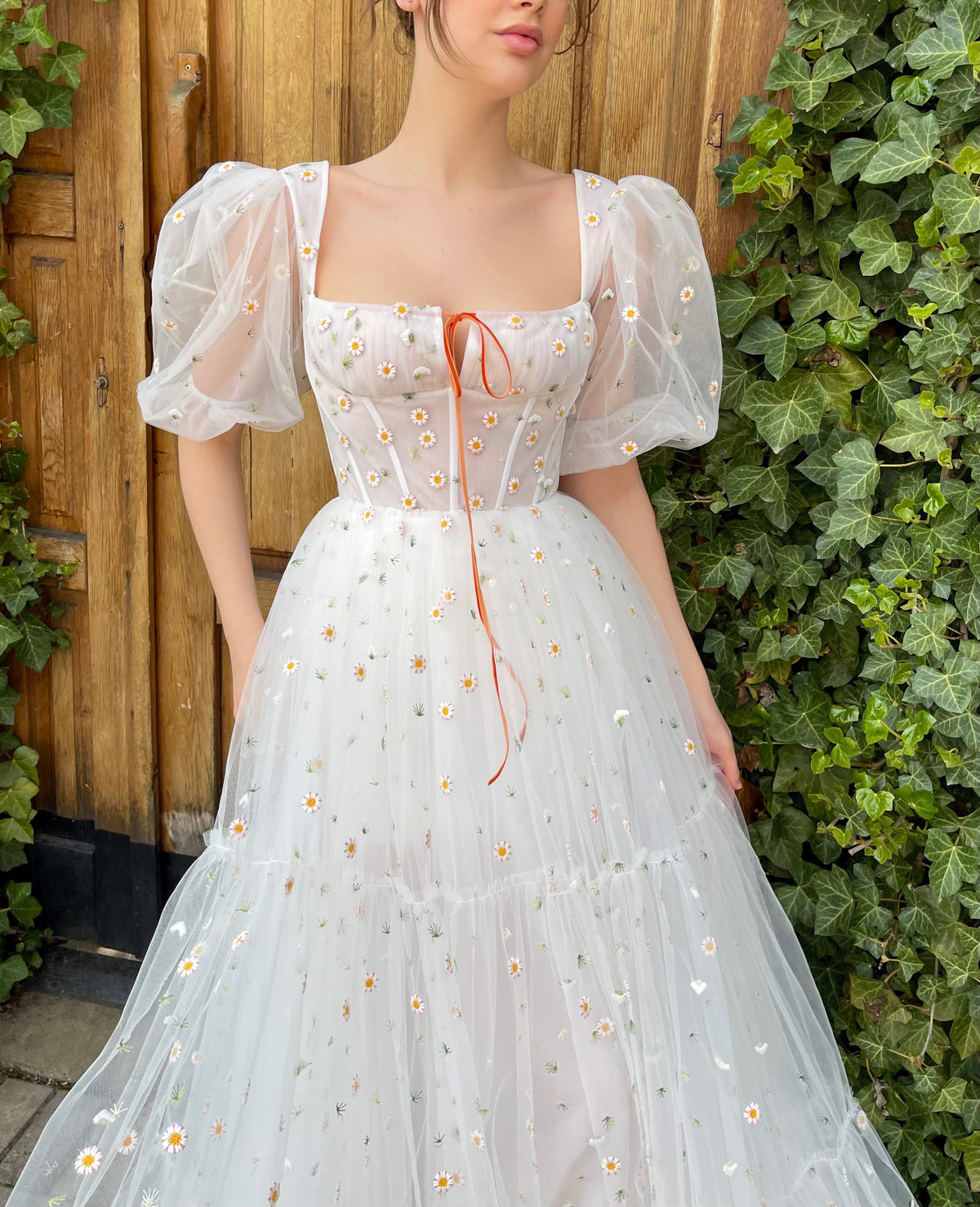 White A-Line bridal dress with short sleeves and embroidered daisies