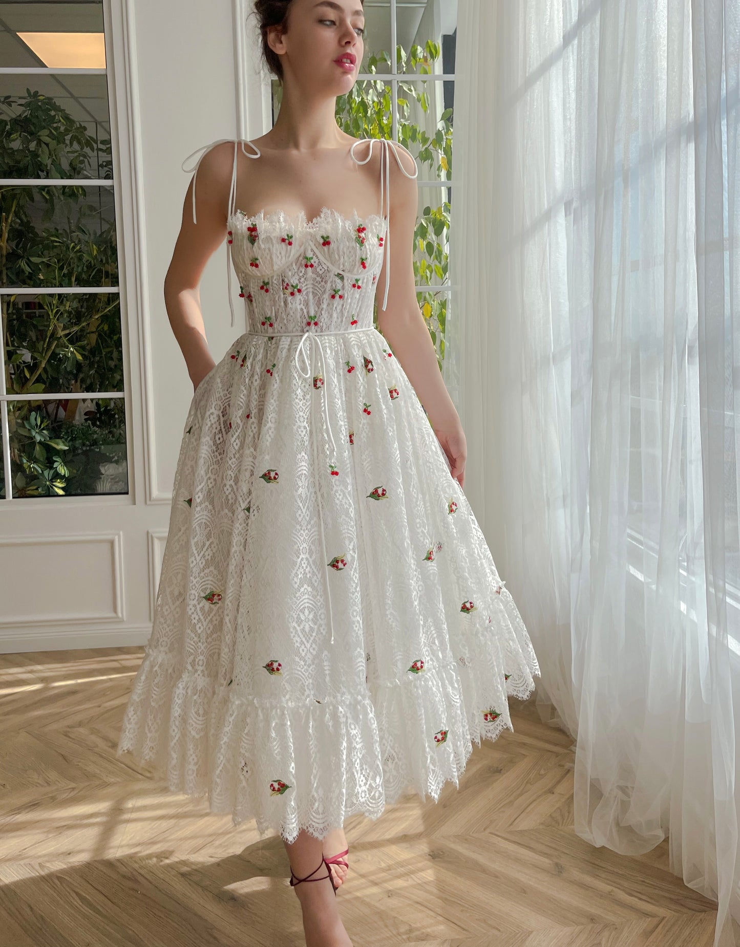 White midi bridal dress with spaghetti straps and embroidered cherries