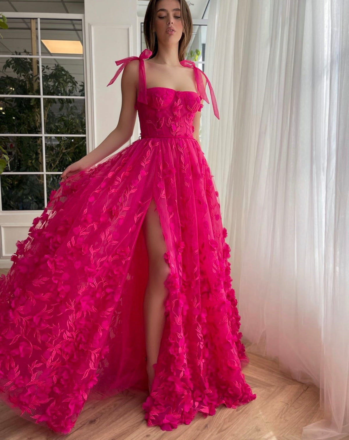 Pink A-Line dress with embroidery and bow straps