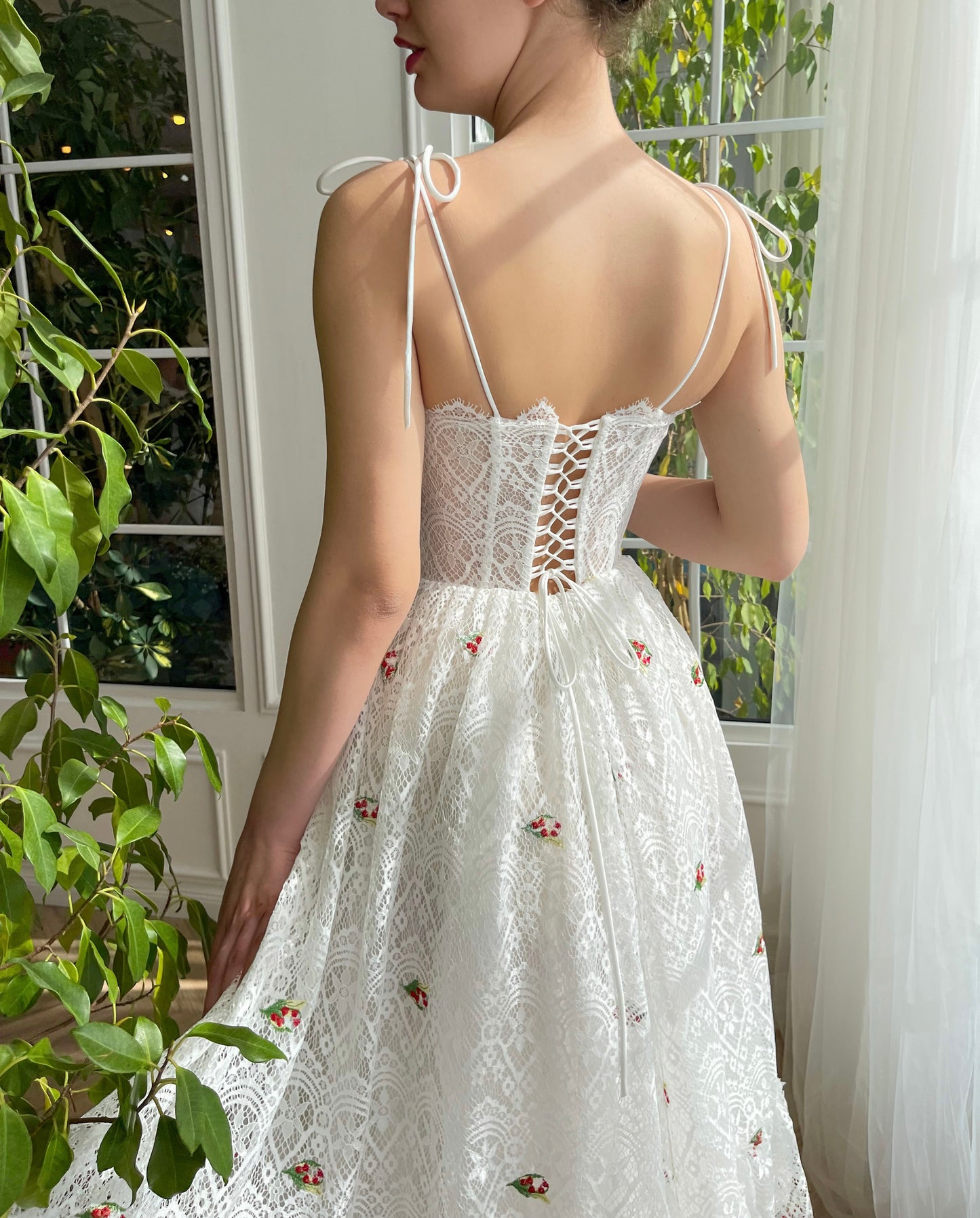 White midi bridal dress with spaghetti straps and embroidered cherries