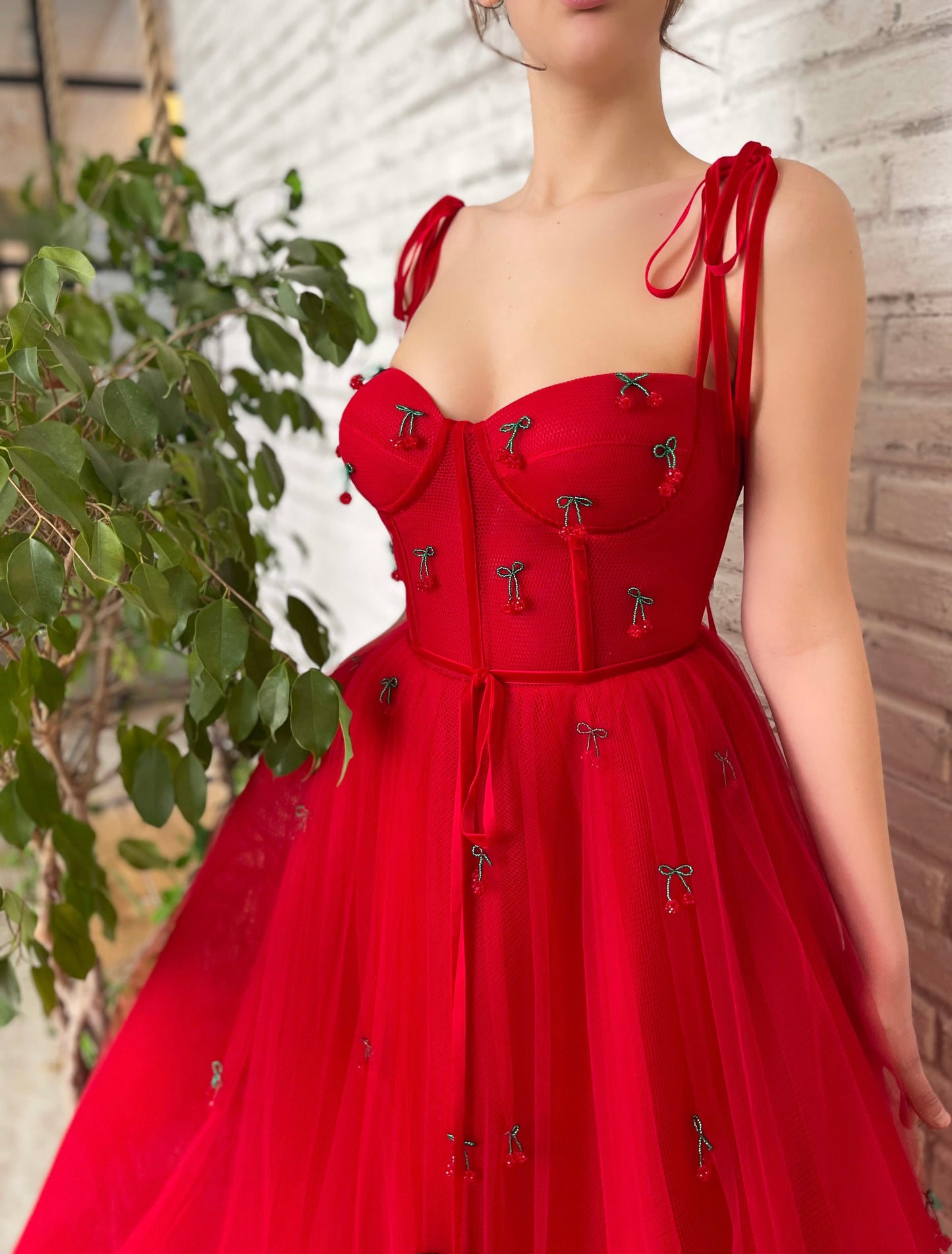 Red midi dress with embroidered cherries and straps
