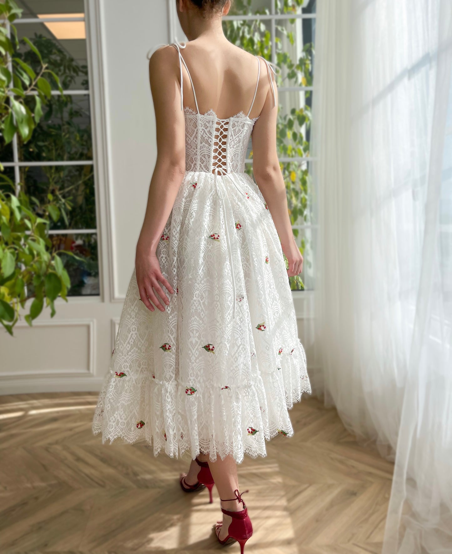White midi bridal dress with spaghetti straps and embroidered cherries