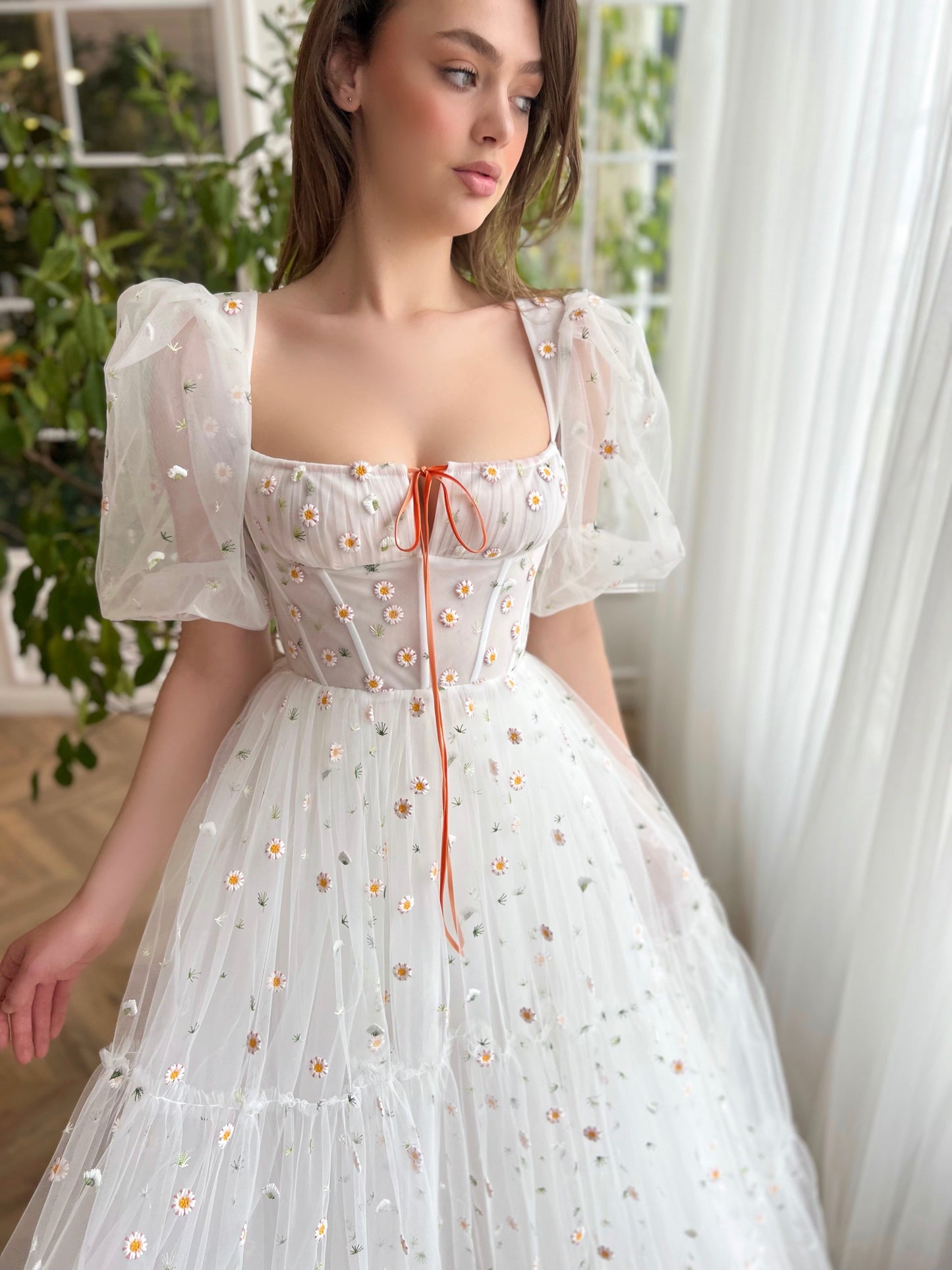 White A-Line bridal dress with short sleeves and embroidered daisies