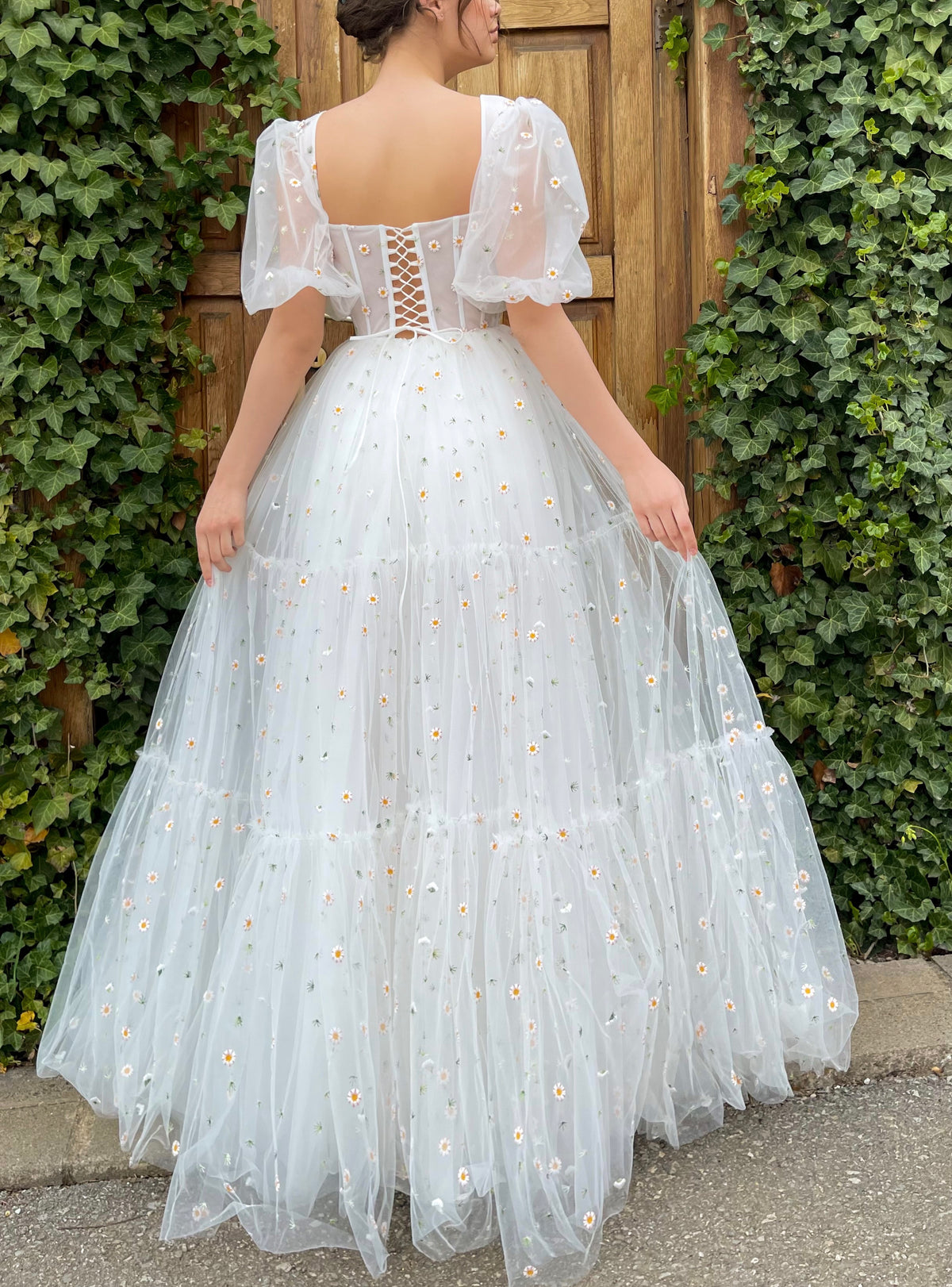 White A-Line bridal dress with short sleeves and embroidered daisies