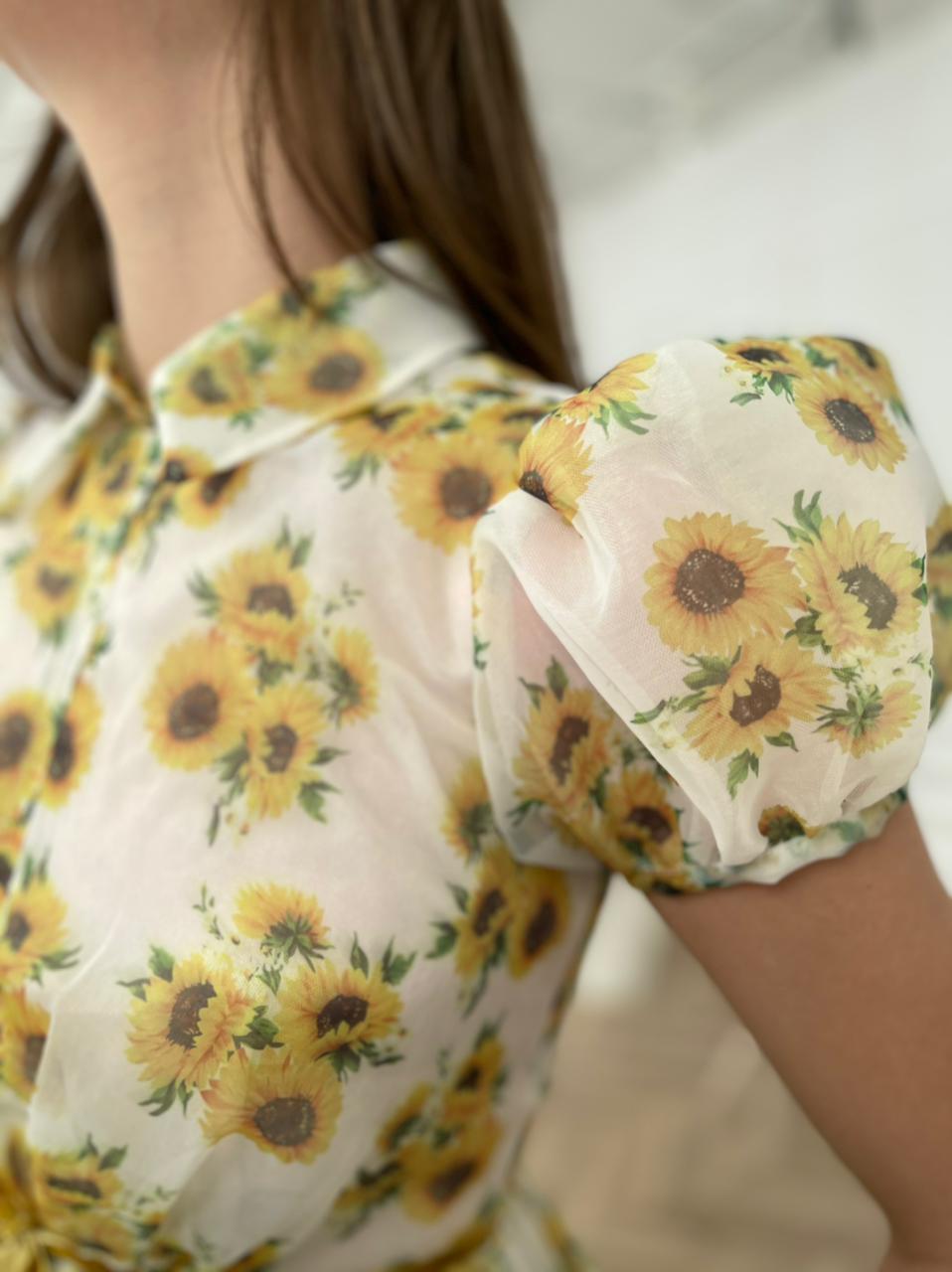 White midi dress with short sleeves and printed flowers
