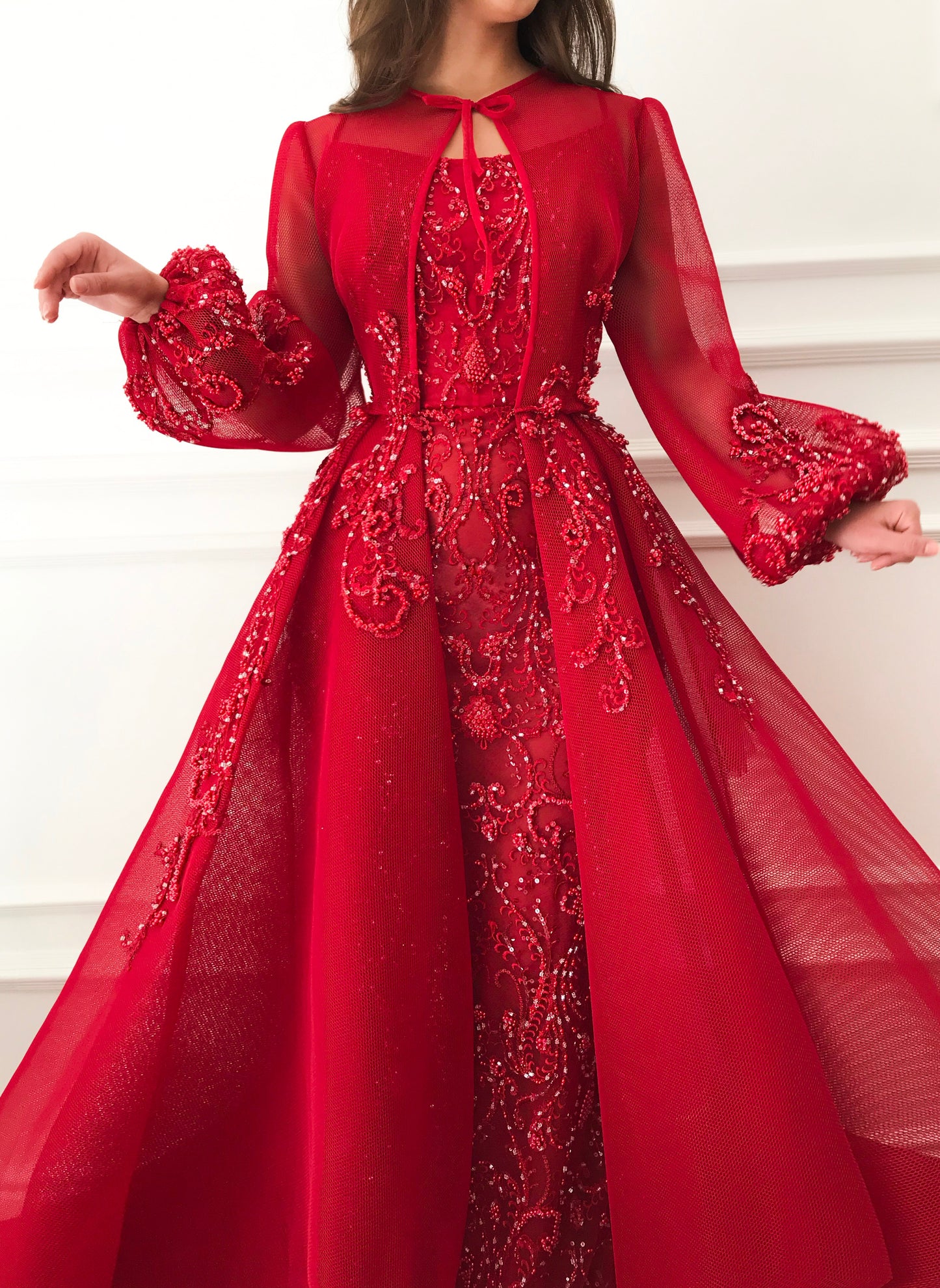 Red overskirt dress with long sleeves and embroidery