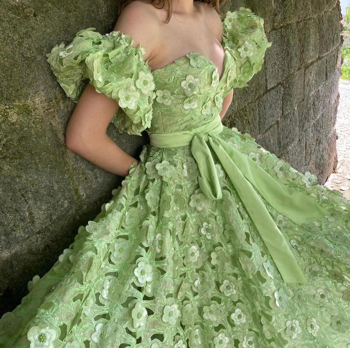 Green A-Line dress with off the shoulder sleeves and flowers