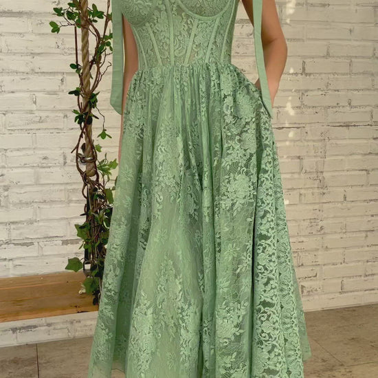 Green midi dress with bow straps