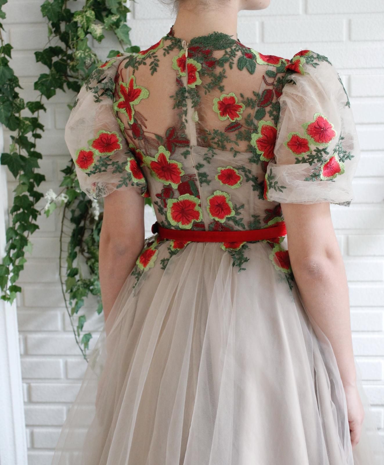 Beige A-Line dress with short sleeves, belt and embroidery