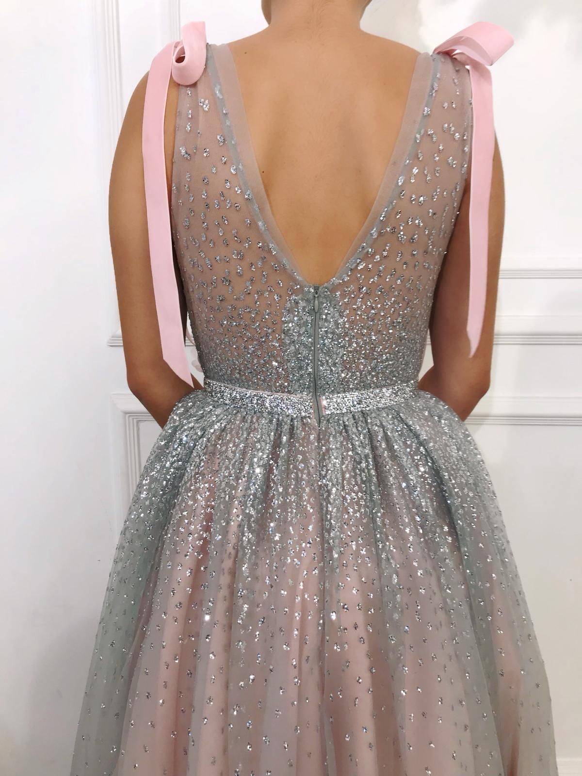 Pink A-Line dress with v-neck, no sleeves and embroidery