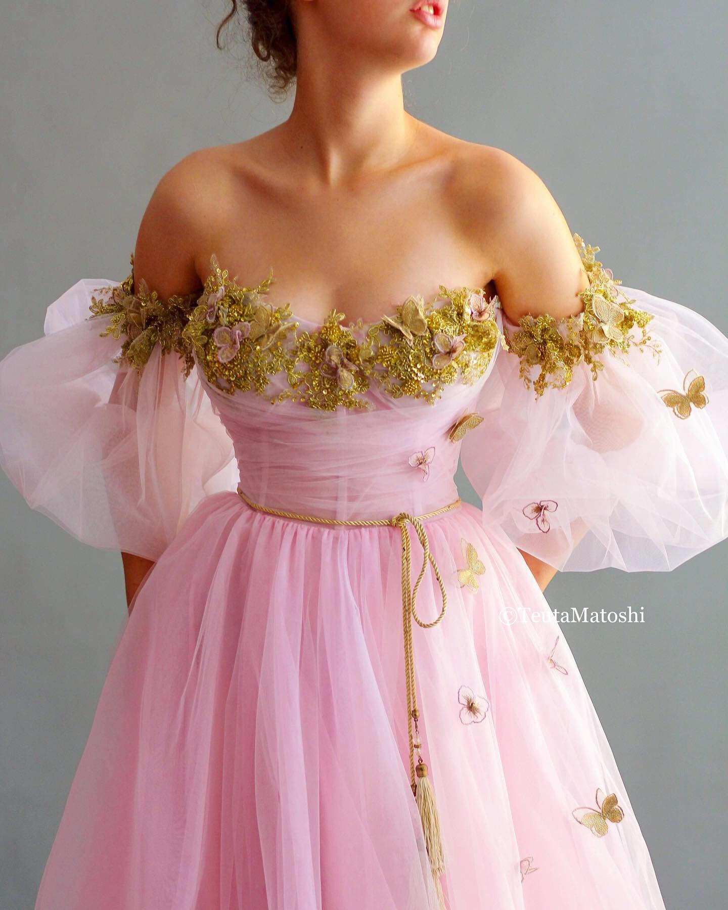 Pink A-Line dress with off the shoulder sleeves and embroidery