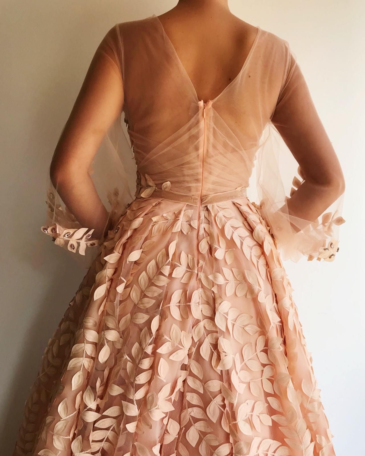 Peach A-Line dress with long sleeves and lace