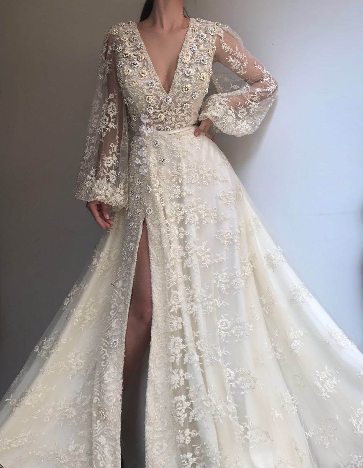 White A-Line dress with v-neck, long sleeves, lace and embroidery