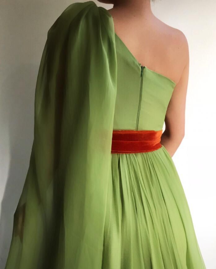 Green A-Line dress with belt and one shoulder cape sleeve