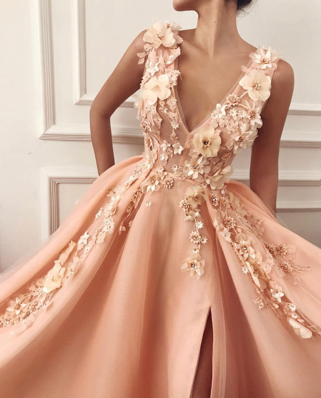 Pink A-Line dress with v-neck, no sleeves and embroidery