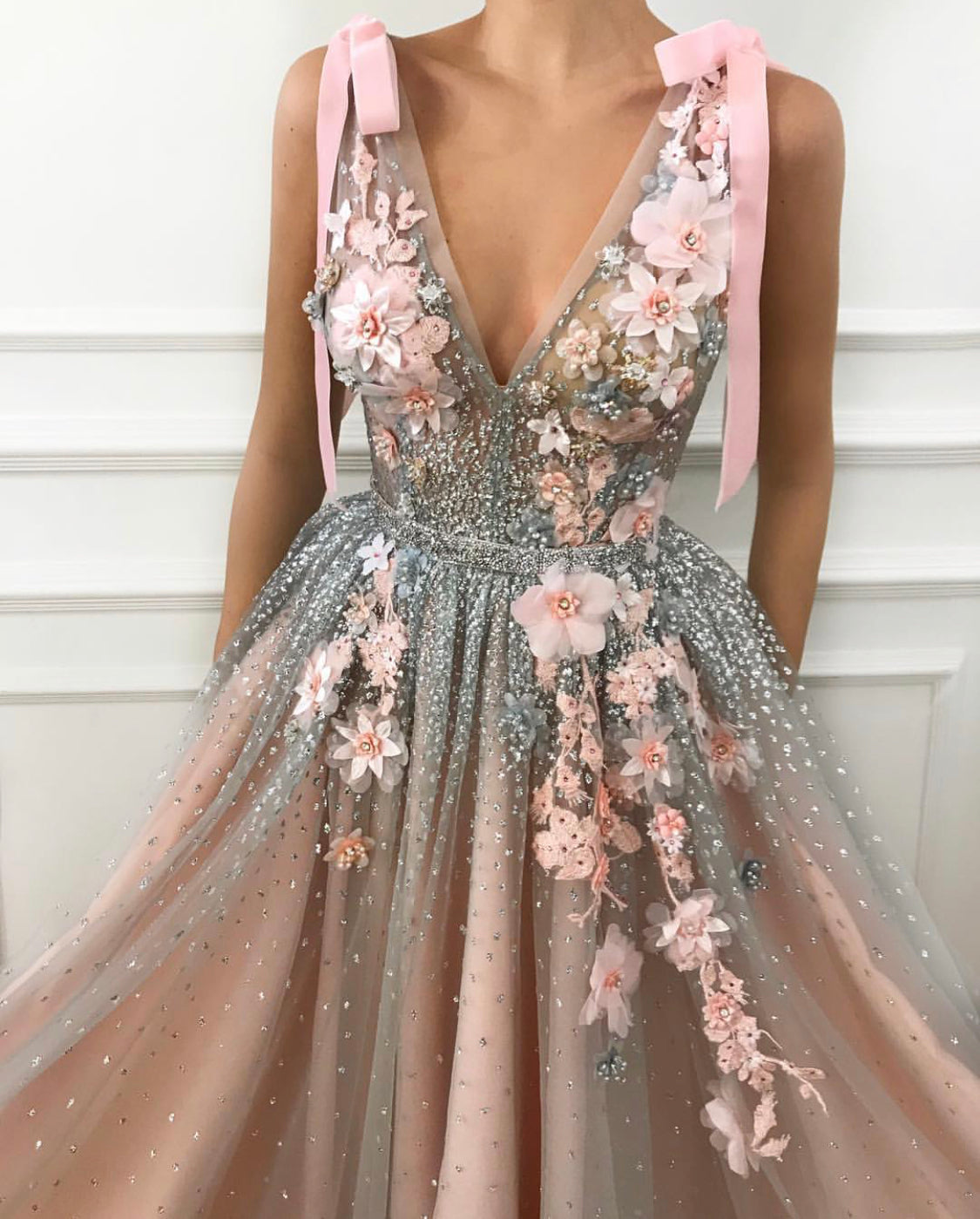 Pink A-Line dress with v-neck, no sleeves and embroidery