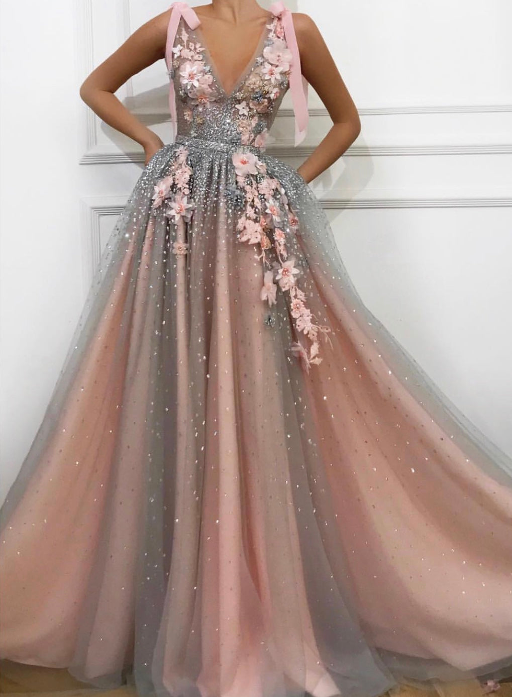 Pink A-Line dress with v-neck, no sleeves and embroidery