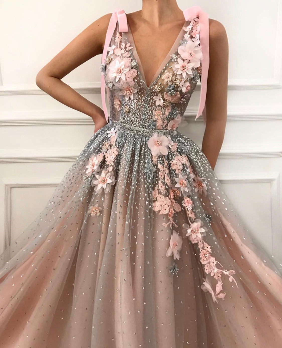 Pink A-Line dress with v-neck, no sleeves and embroidery