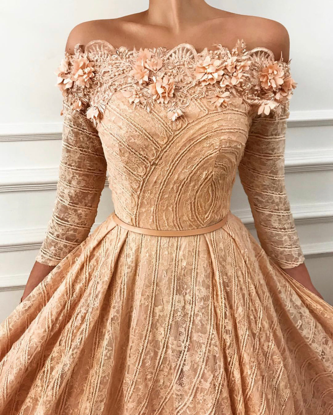 Pink A-Line dress with long off the shoulder sleeves and embroidery