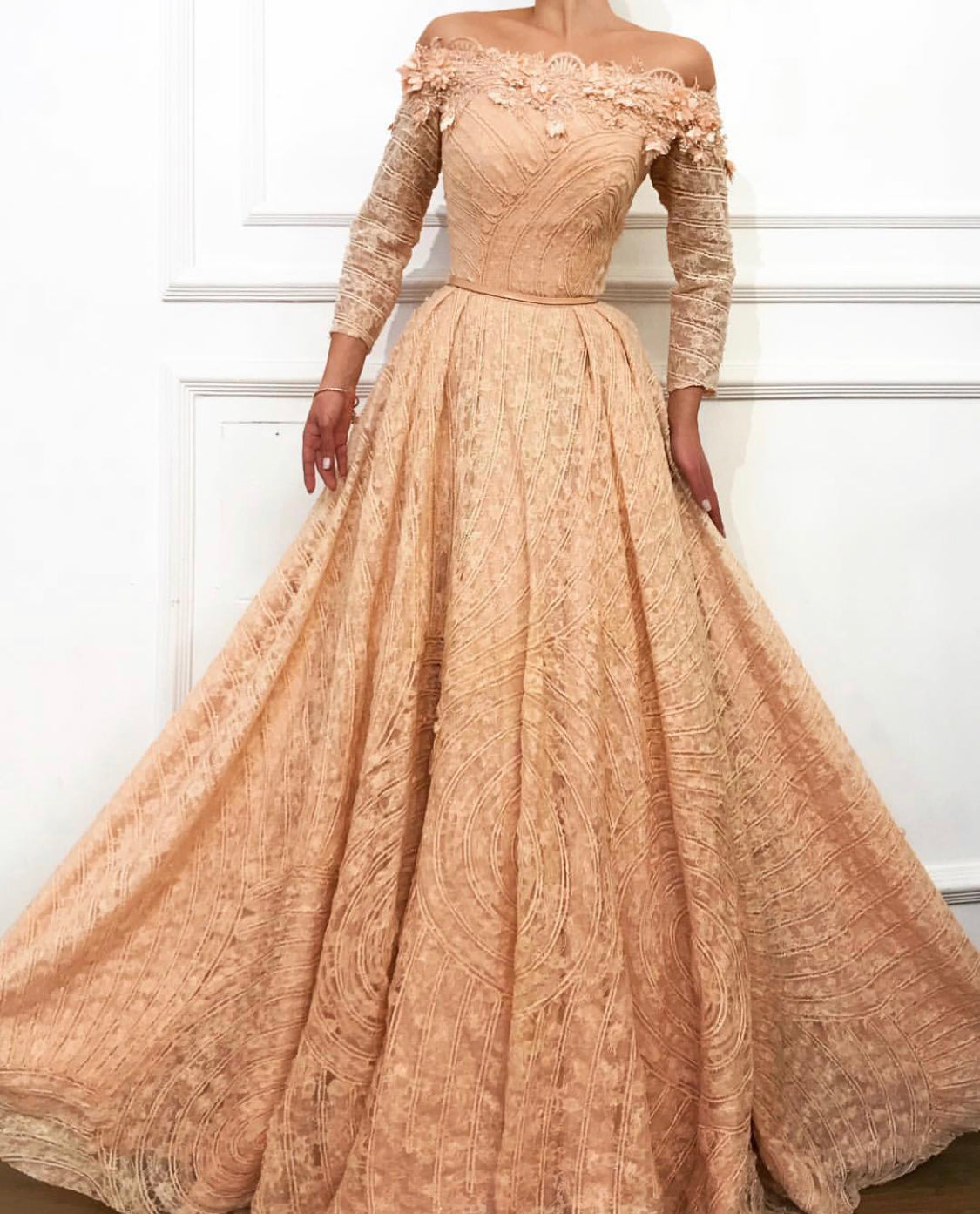 Pink A-Line dress with long off the shoulder sleeves and embroidery