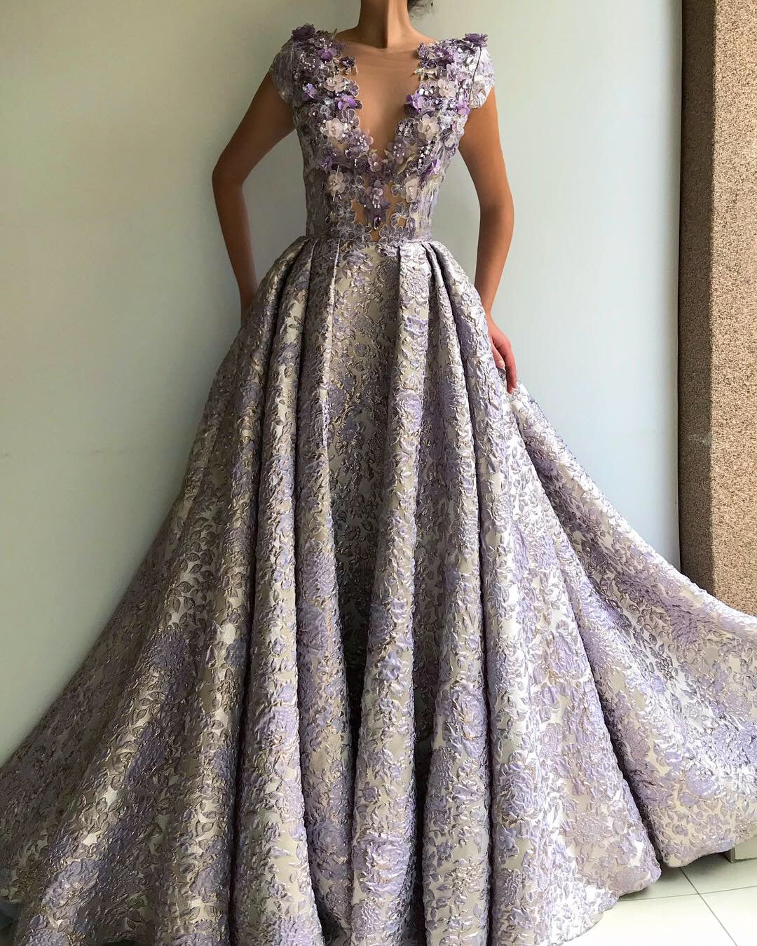 Grey A-Line dress with no sleeves, v-neck and embroidery