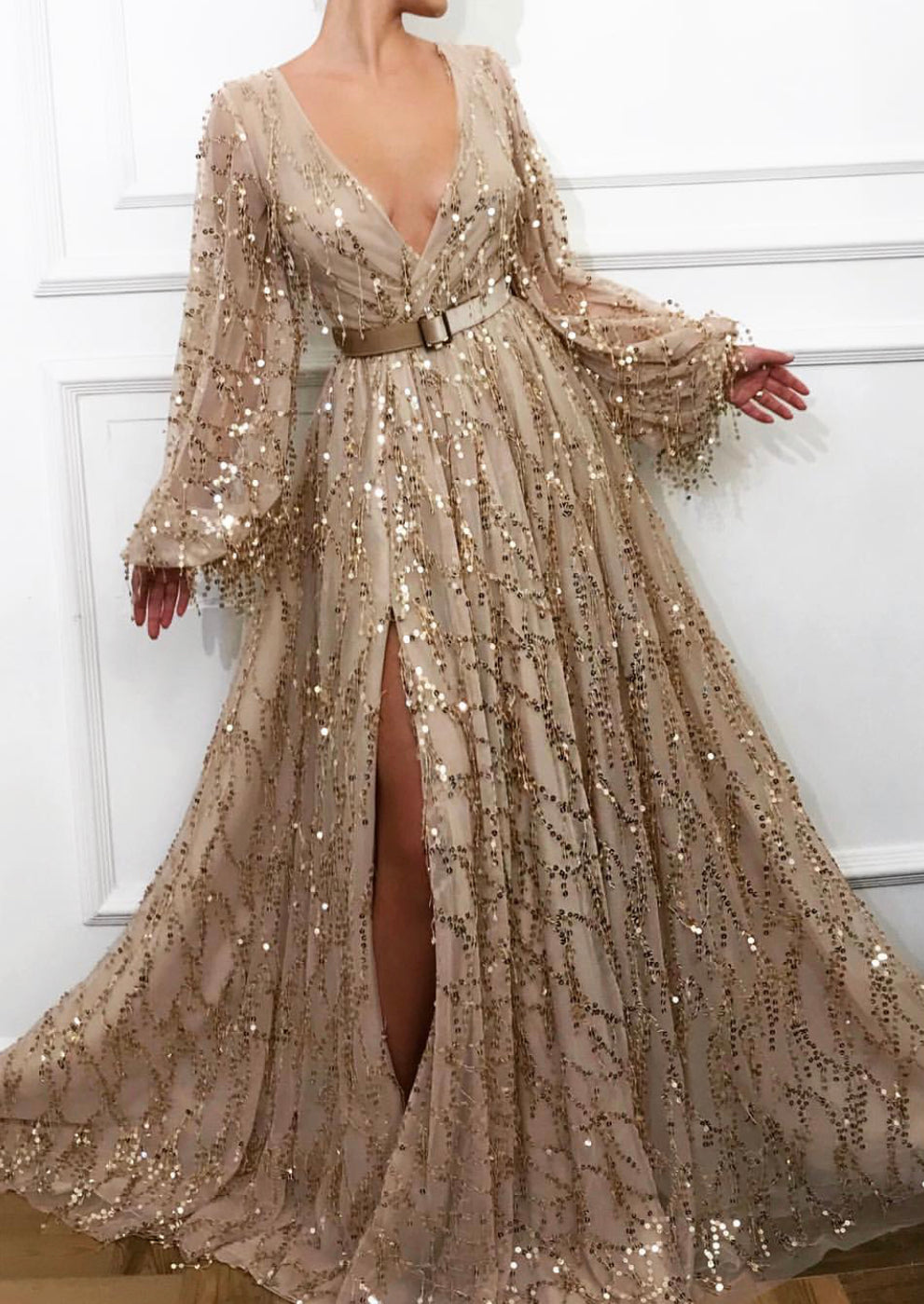 Gold A-Line dress with belt, v-neck, sequins and long sleeves