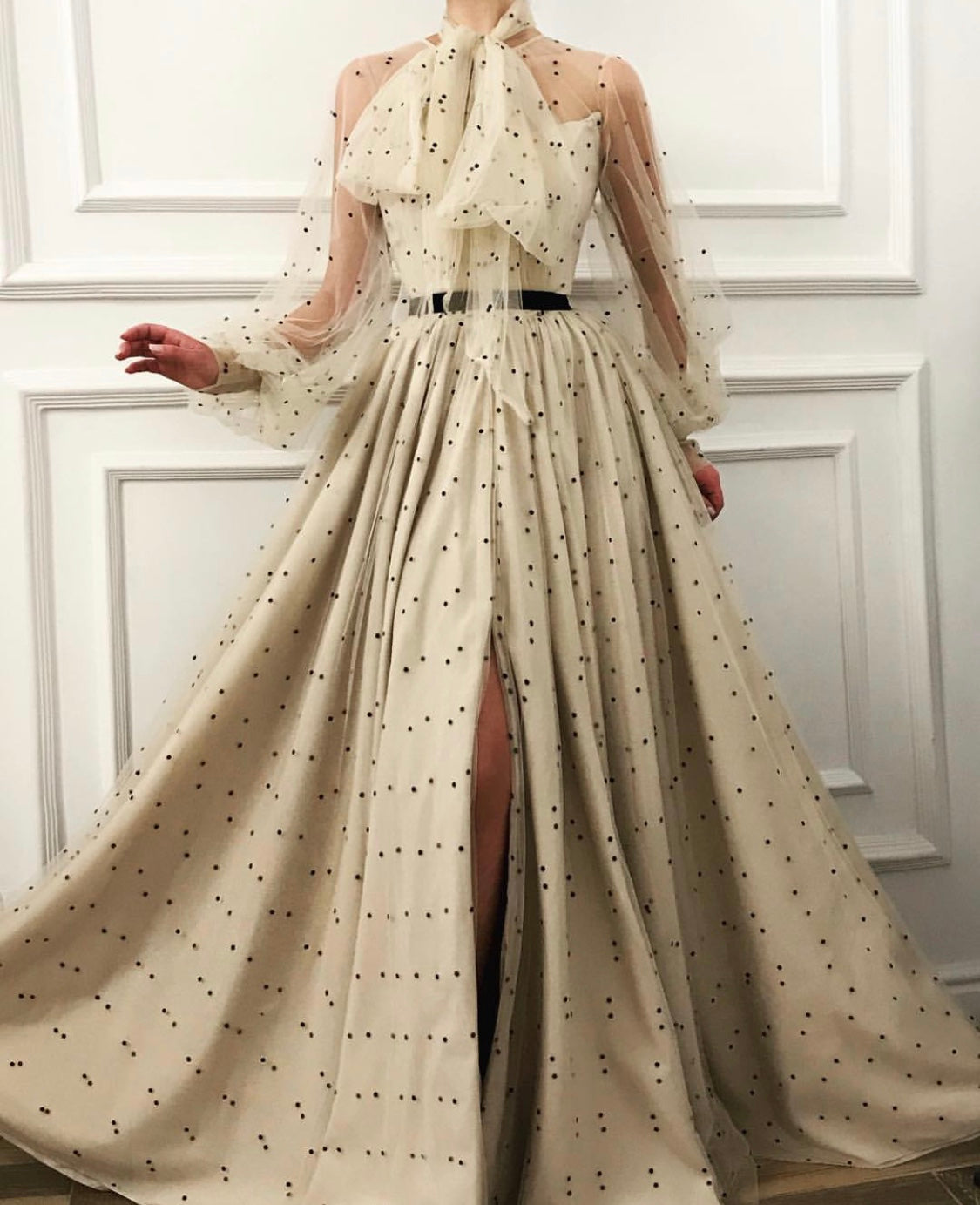 Beige A-Line dress with long sleeves and dotted fabric