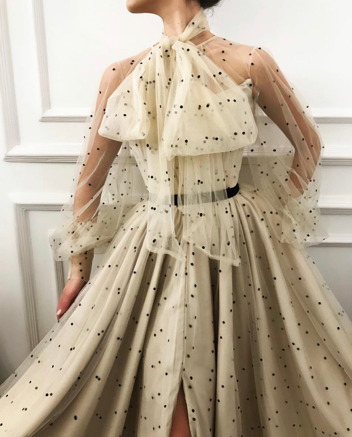 Beige A-Line dress with long sleeves and dotted fabric