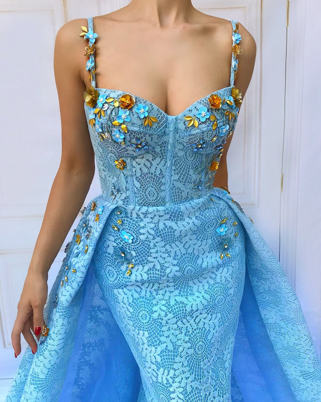 Blue overskirt dress with spaghetti straps and embroidery