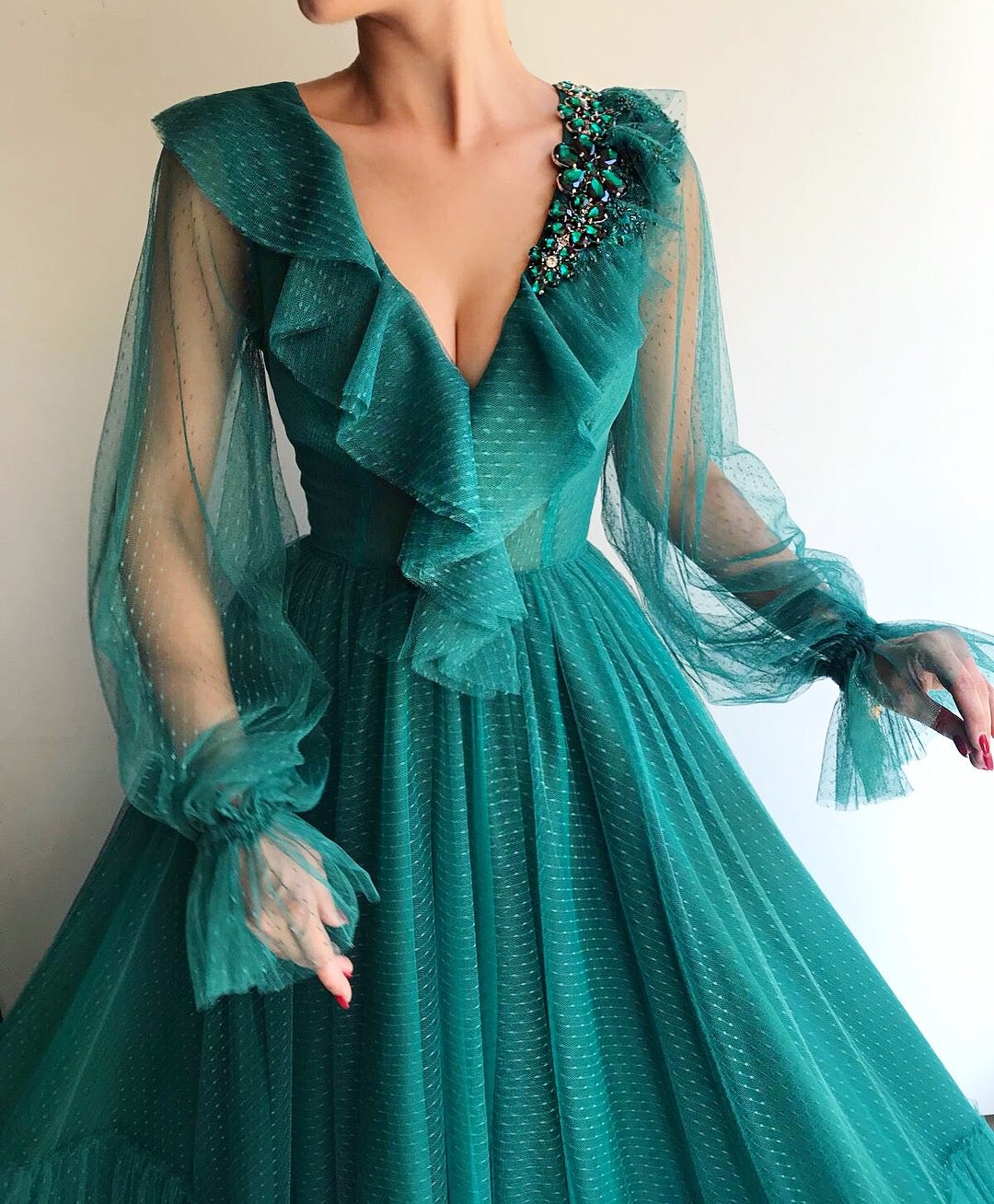 Green A-Line dress with v-neck, long sleeves and embroidery
