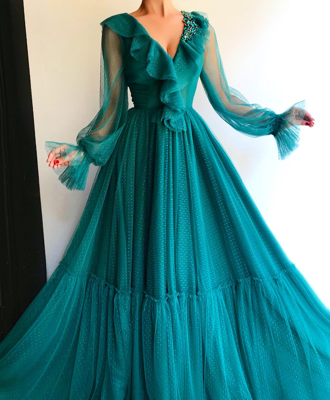 Green A-Line dress with v-neck, long sleeves and embroidery