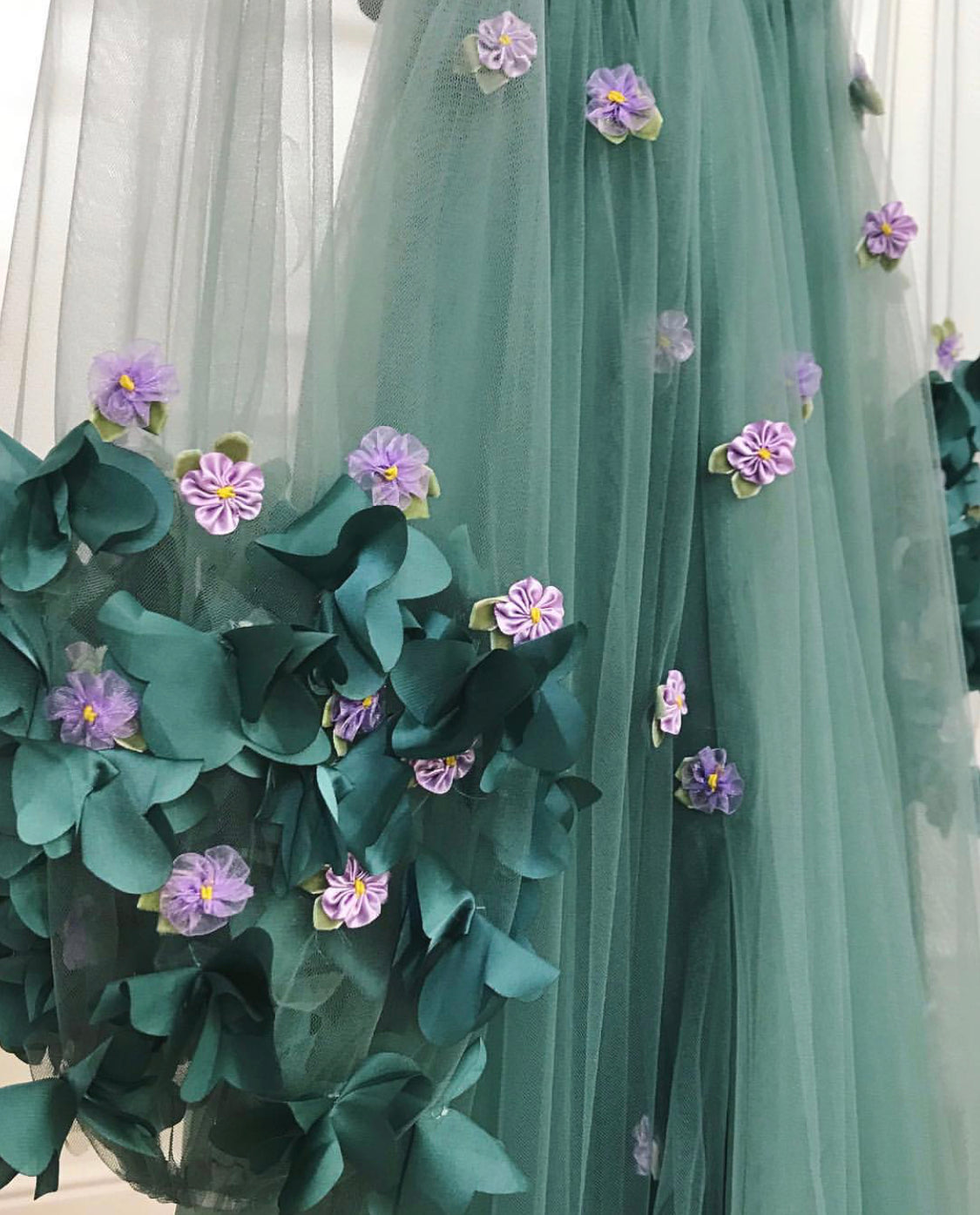 Green A-Line dress with long sleeves, v-neck and embroidery