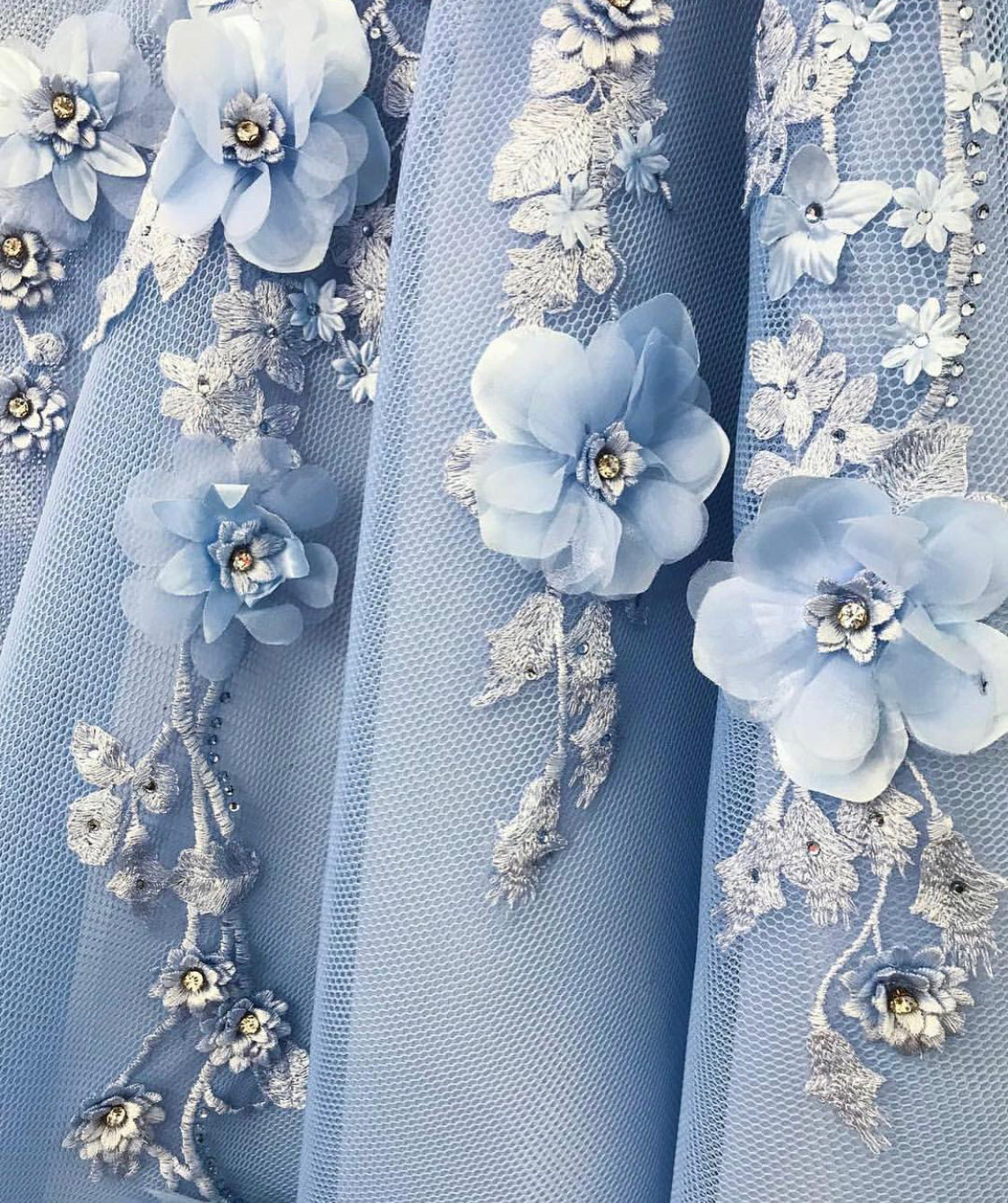 Blue A-Line dress with off the shoulder sleeves and embroidered flowers