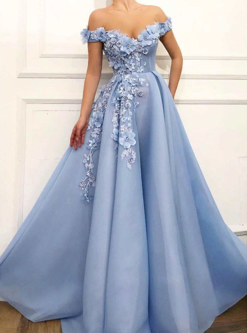 Blue A-Line dress with off the shoulder sleeves and embroidered flowers