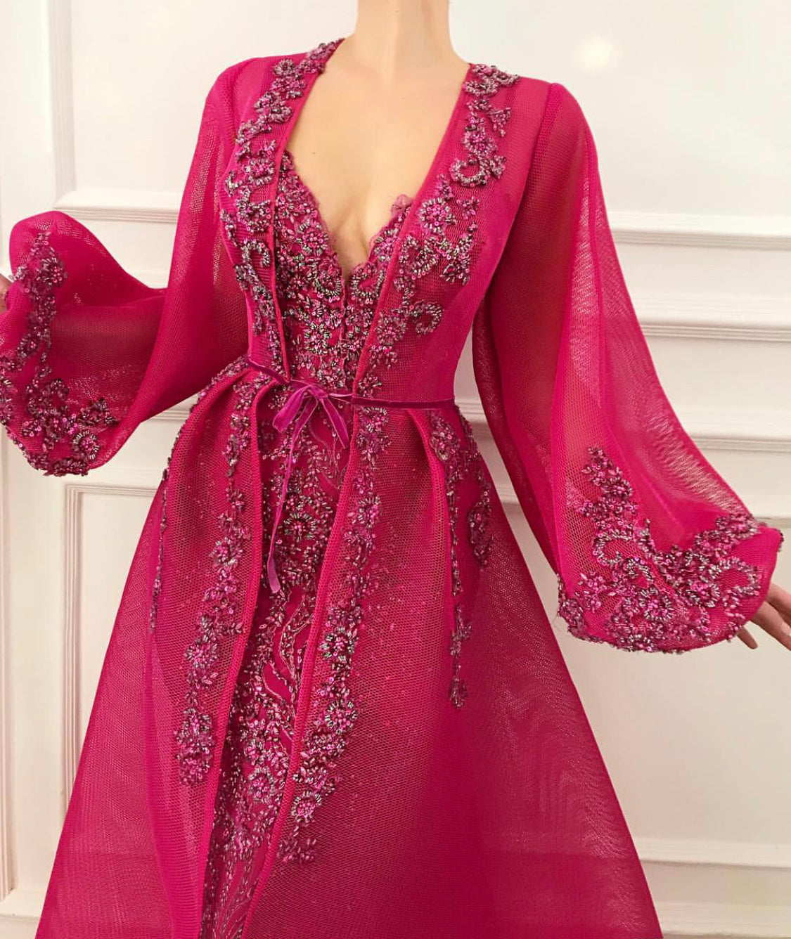 Pink overskirt dress with v-neck, long sleeves and embroidery