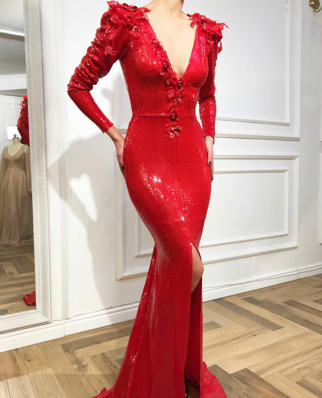 Red mermaid dress with long sleeves, sequins, v-neck and embroidery