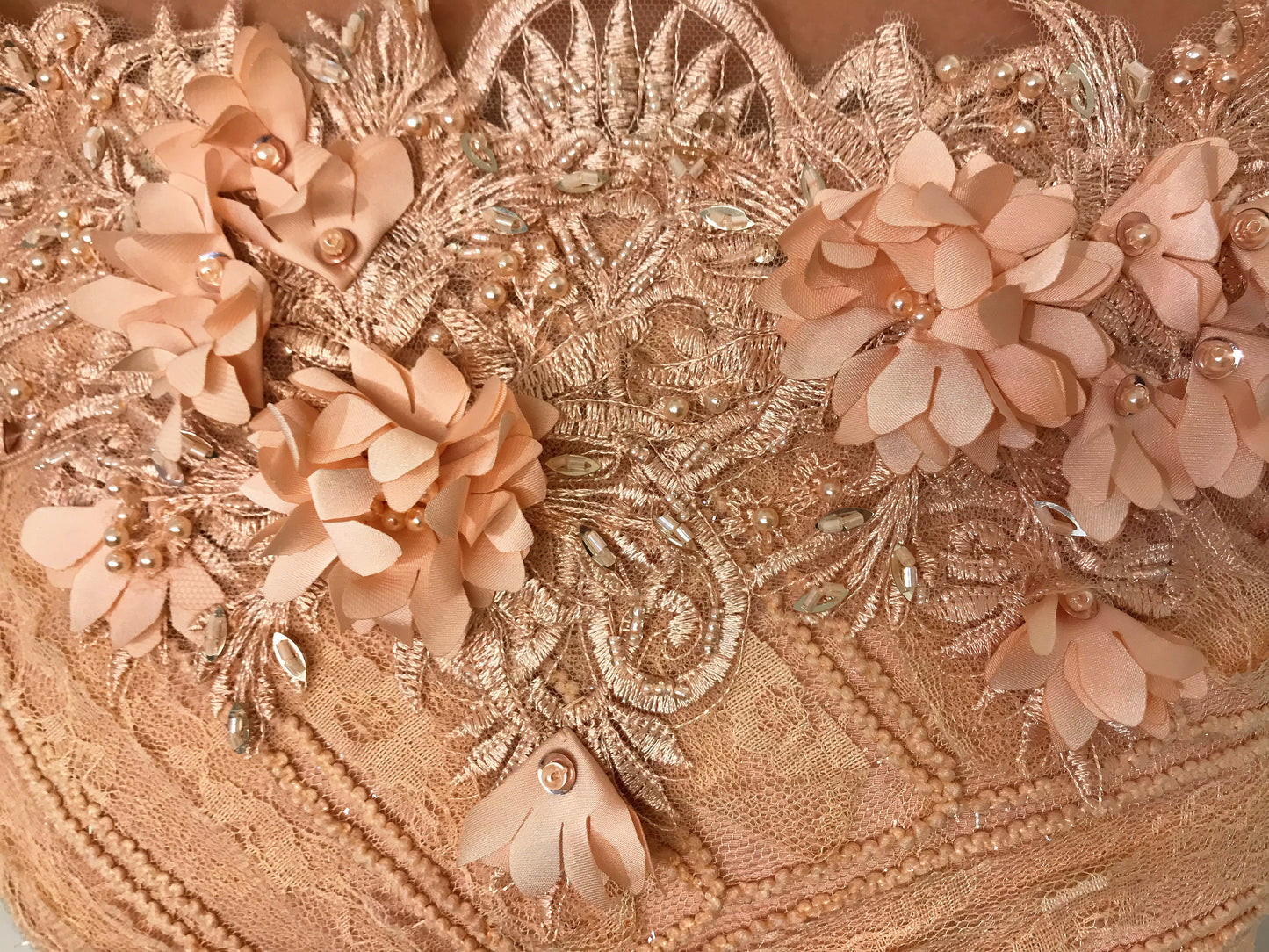 Pink A-Line dress with long off the shoulder sleeves and embroidery