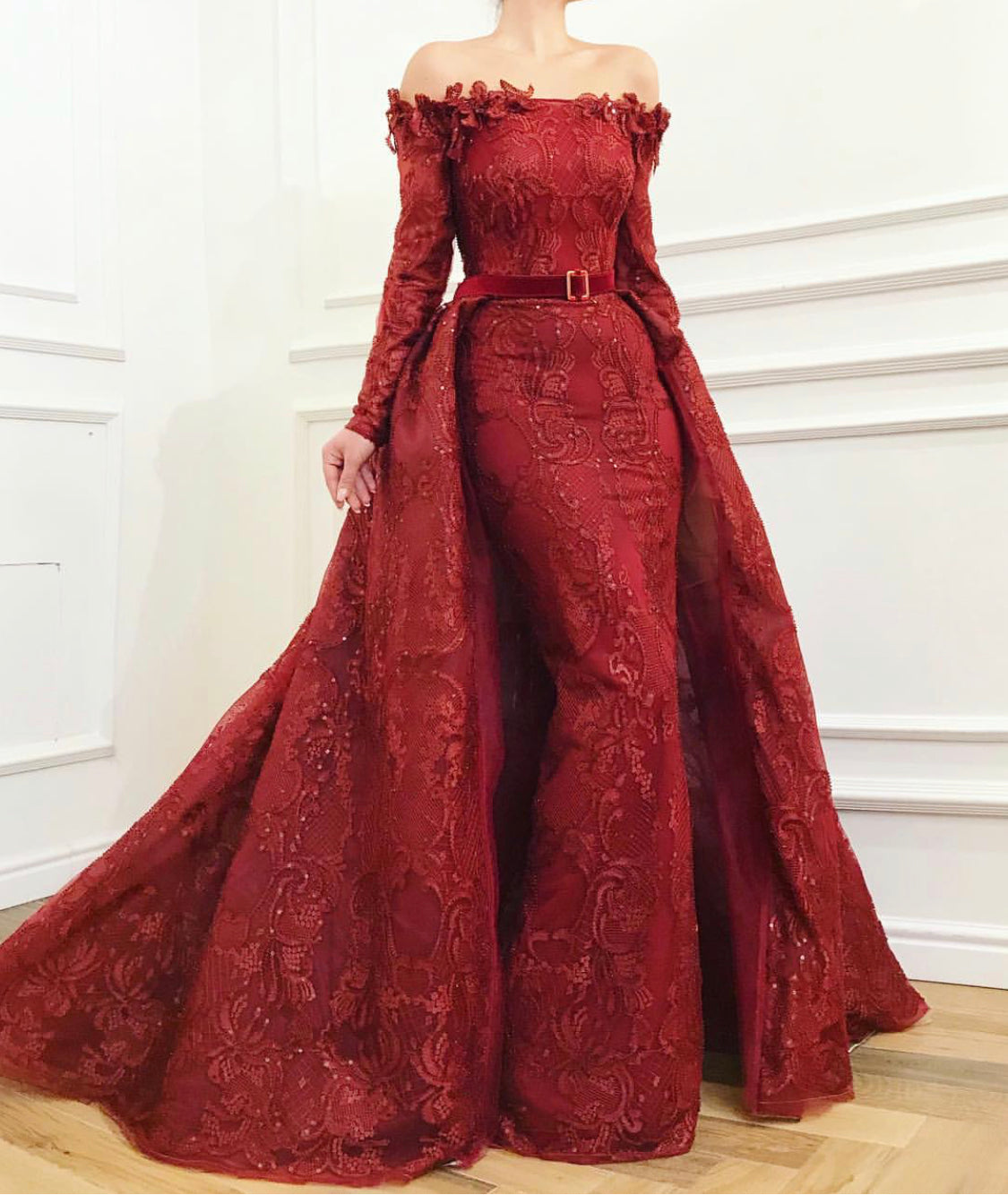 Red overskirt dress with lace, embroidery, belt and long off the shoulder sleeves