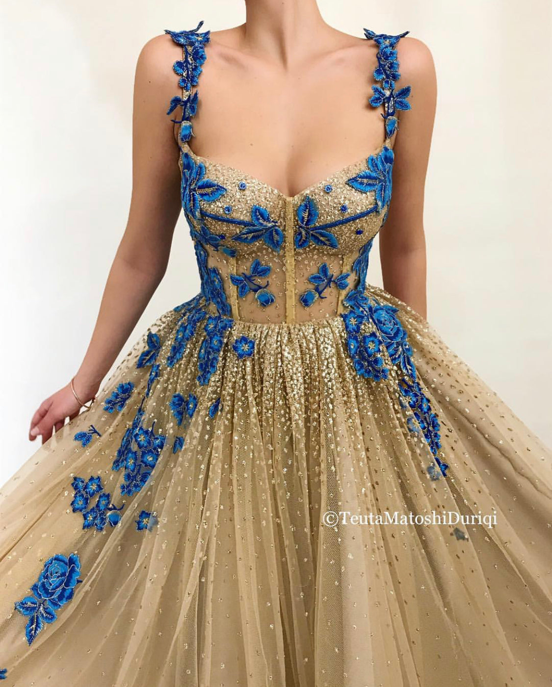 Gold A-Line dress with spaghetti straps and embroidery