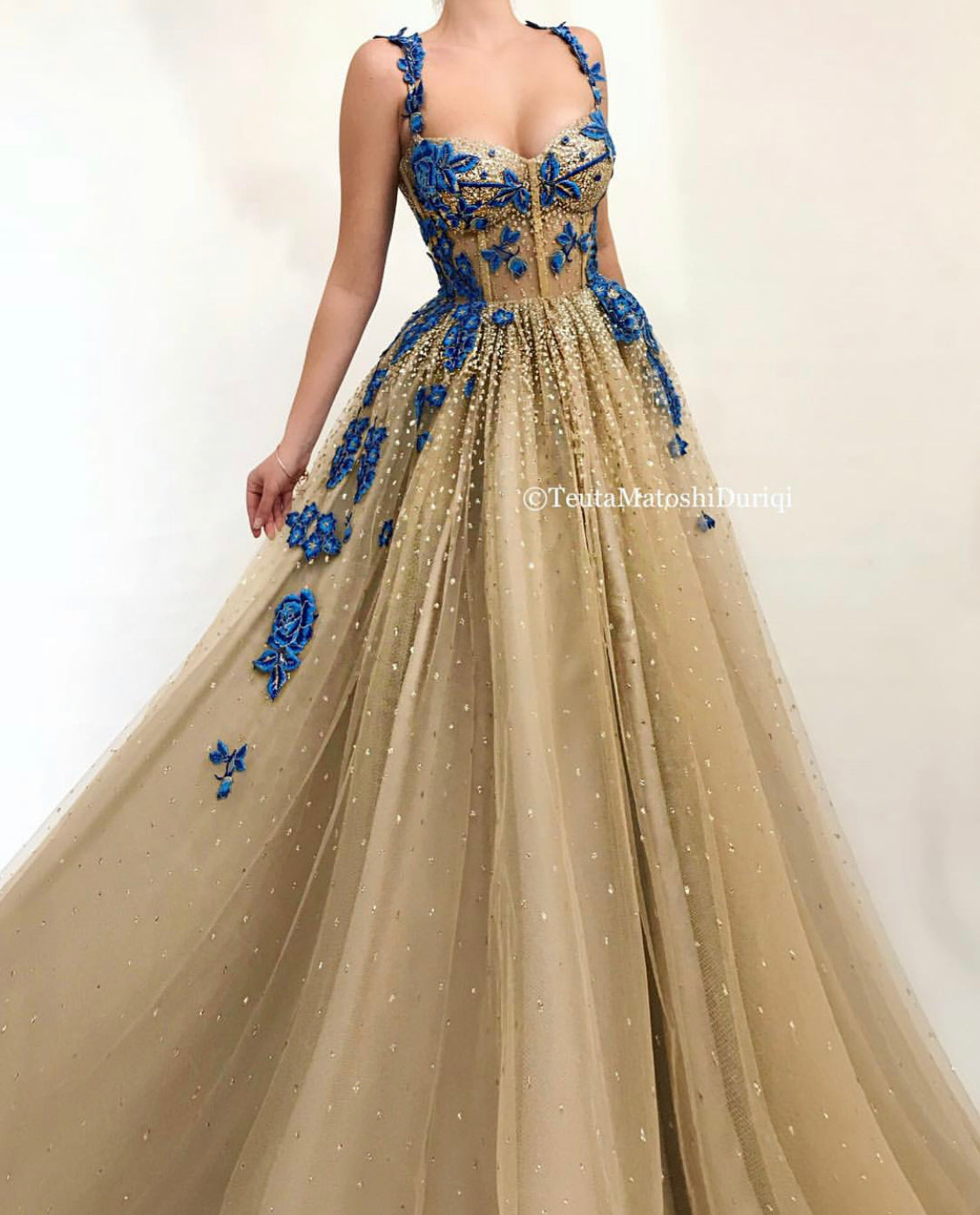 Gold A-Line dress with spaghetti straps and embroidery