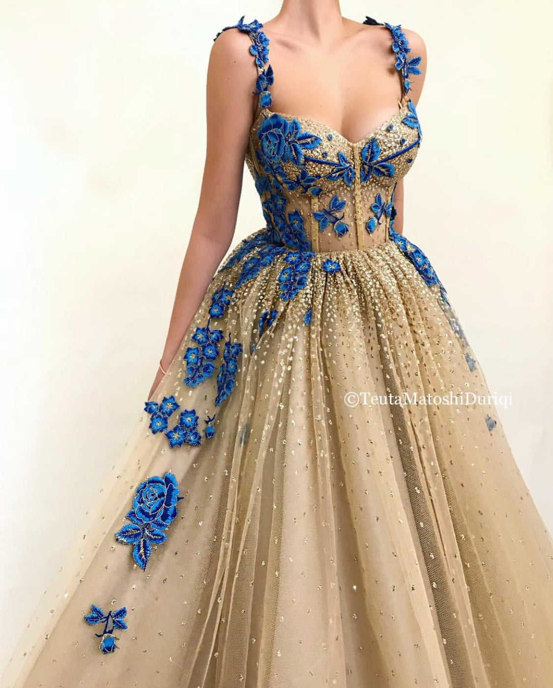 Gold A-Line dress with spaghetti straps and embroidery