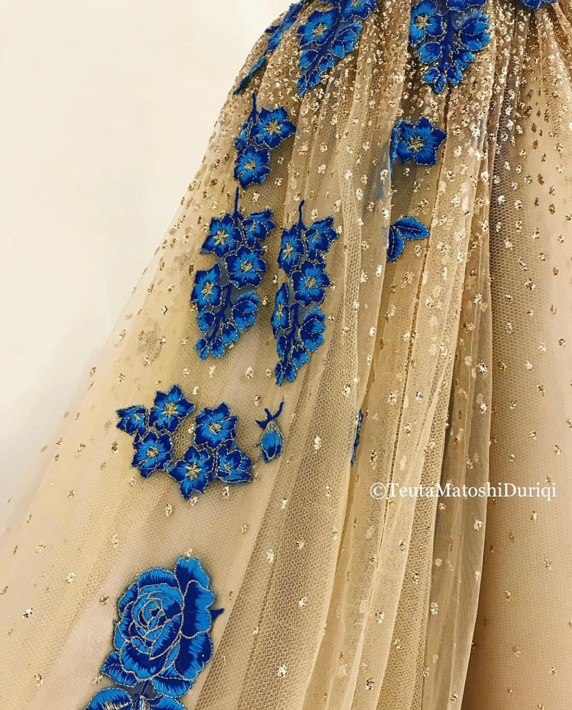 Gold A-Line dress with spaghetti straps and embroidery