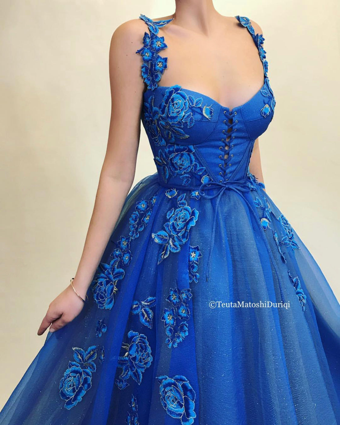 Blue A-Line dress with spaghetti straps and embroidery