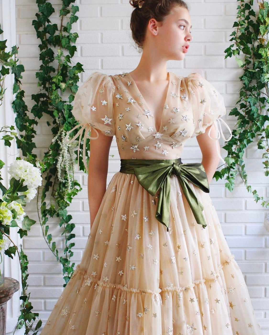 Beige A-Line dress with short sleeves, v-neck and starry fabric