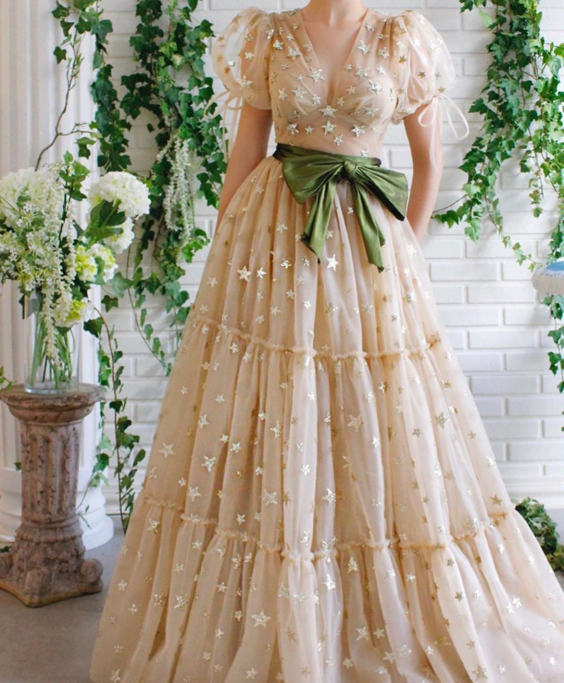 Beige A-Line dress with short sleeves, v-neck and starry fabric