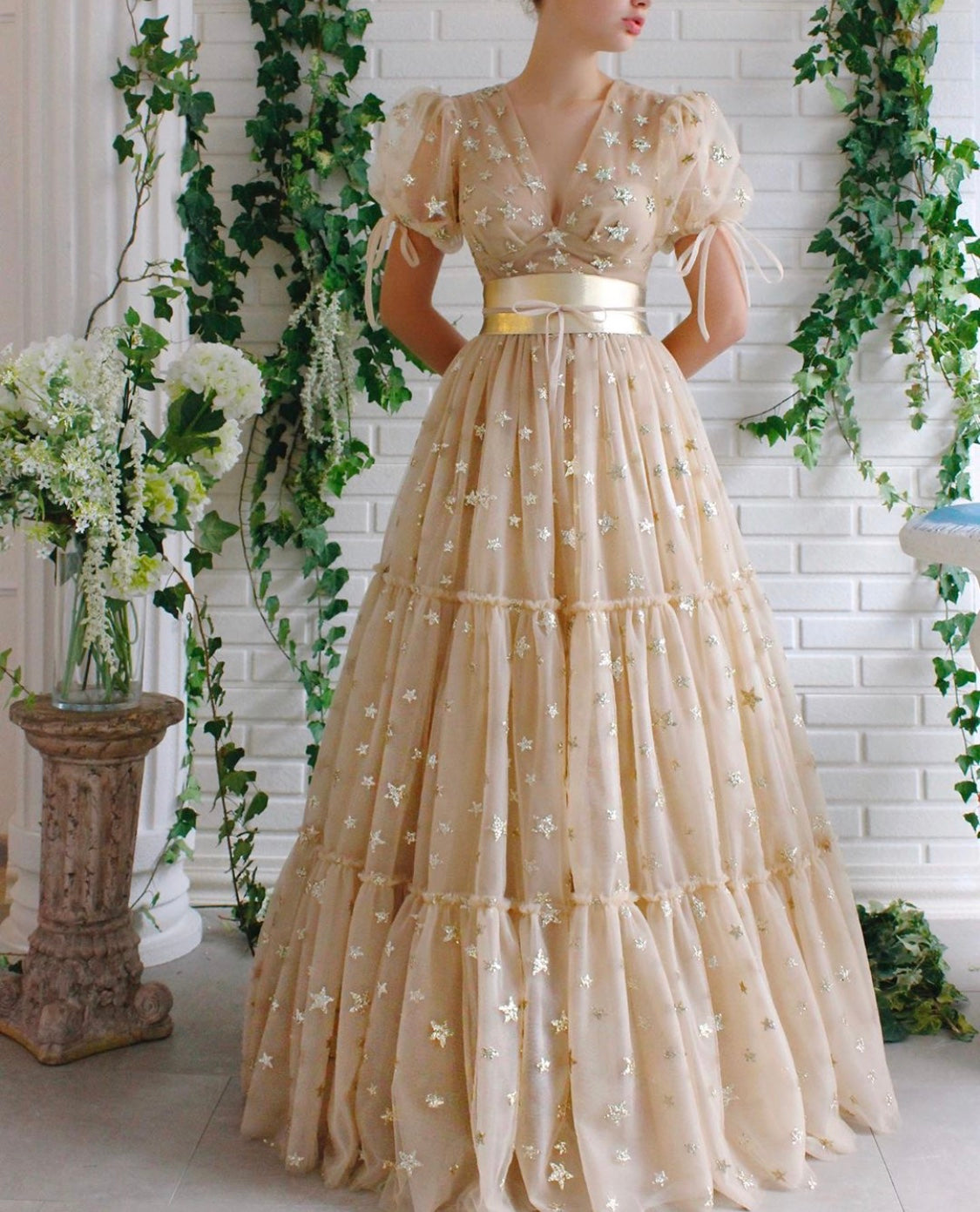 Beige A-Line dress with short sleeves, v-neck and starry fabric