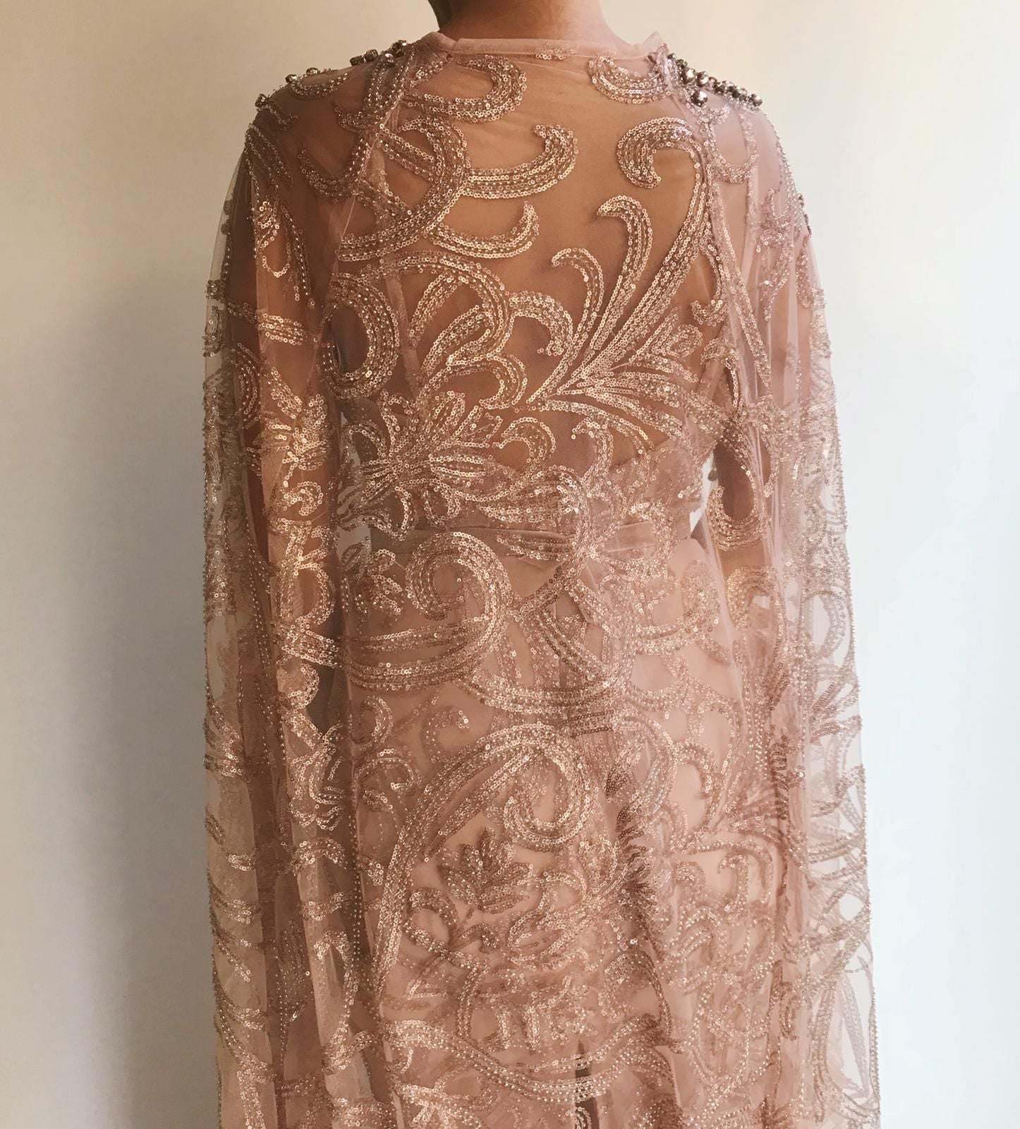 Pink mermaid dress with v-neck, cape and embroidery
