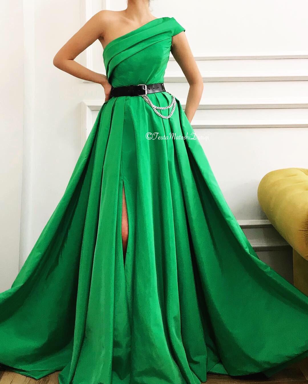Green A-Line dress with belt and one shoulder sleeve