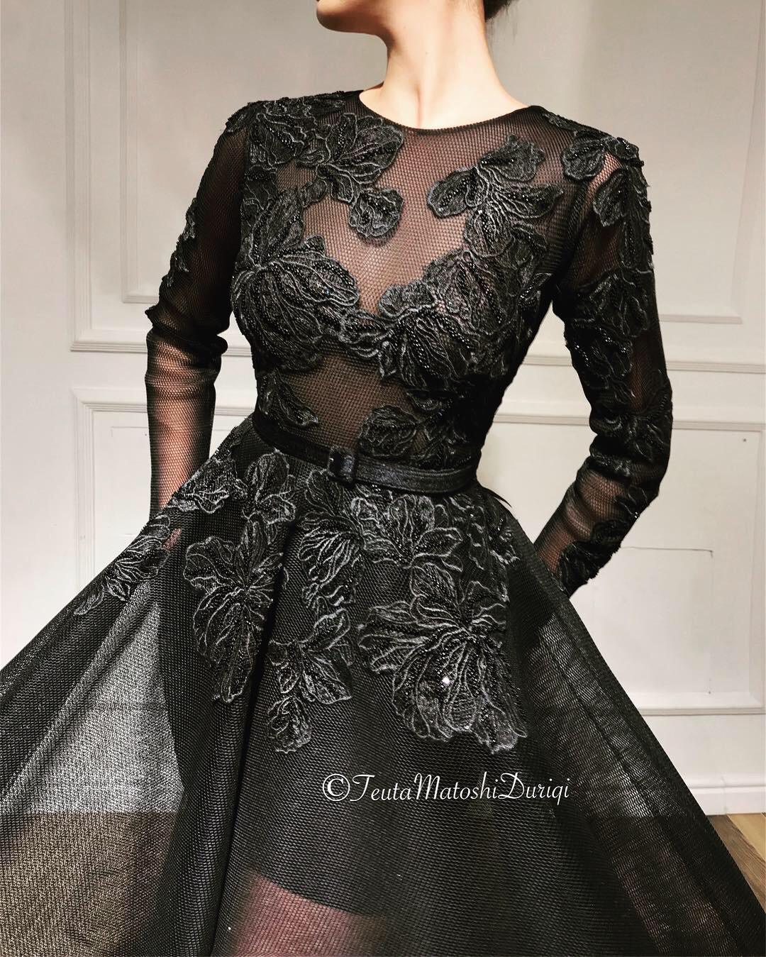 Black A-Line dress with belt, long sleeves and lace