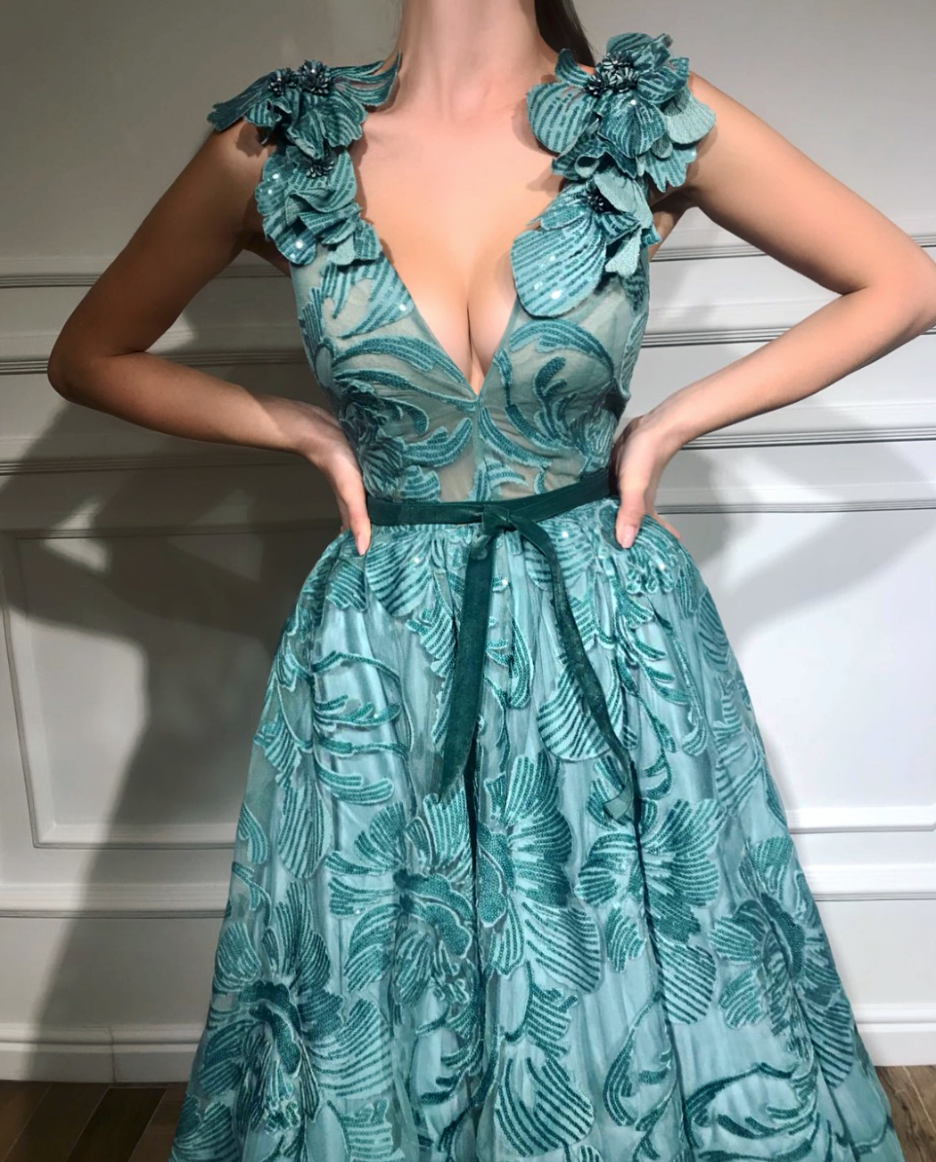 Blue A-Line dress with v-neck, no sleeves and embroidery
